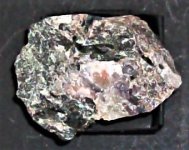 Catapleiite, Microcline, Sodalite, Norra Karr, Granna, Sweden, FOV=1.5 in, natural light.JPG