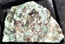Microcline, Calcite, Sterling Hill mine, Franklin, Sussex Co., NJ, FOV= 1 in., natural light.JPG
