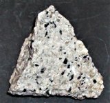 Sodalite syenite, Red Hill, Morltonborough, NH, FOV=2.5 in., natural light.JPG
