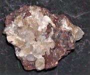 Calcite with fluorapatite, Road cut outcrop on Hwy 519, Rio Arribo Co., NM, FOV =1.5 in., natura.JPG