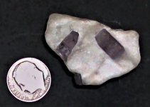 Marialite in dolomite marble, Badakhshan, Afghanistan, US dime for scale, natural light.JPG