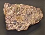 Powellite-bearing rock Hwy 80 prospect, Hidalgo Co., NM Specimen is 7 cm X 4.5 cm natural light.jpg