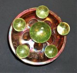 U glass marbles on 3 in diameter Carnival glass flower frog natural light.jpg
