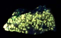 Norbergite in Franklin Marble, Franklin, Sussex Co., NJ FOV 4 in. UV SW 254nm 5 watts.jpg