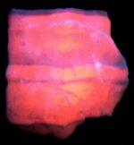 Manganocalcite, Casapalca mine, Casapalca, Peru, FOV 4.0 in., UVLW 365 nm.jpg