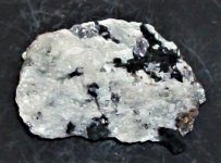 Scapolite, var. meionite, with augite, Franklin Mine, Sussex Co., NJ, FOV= 2.75 in, natural ligh.JPG
