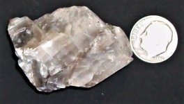Calcite Sterling Hill Mine, Ogdensberg, Sussex Co., NJ, US dime for scale, natural light.JPG
