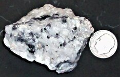 Calcite, crazy, Sterling Hill Mine, Ogdensburg, Sussex Co., NJ, US dime for scale, natural light.JPG