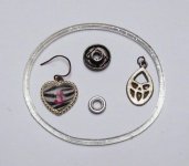 Otter Creek elementary 08 21 2011 J heart earring, button, grommet, pendant, plastic bracelet.jpg